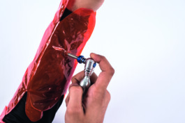 close up of an arm in suit that is being inflated burg giebichenstein kunsthochschule halle  industrial design experimental design methods